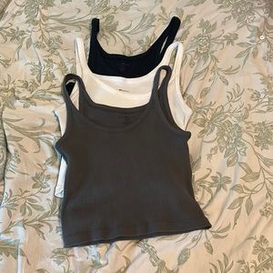 3 pack brandy Melville cropped tank top. Grey navy and white . Never been worn